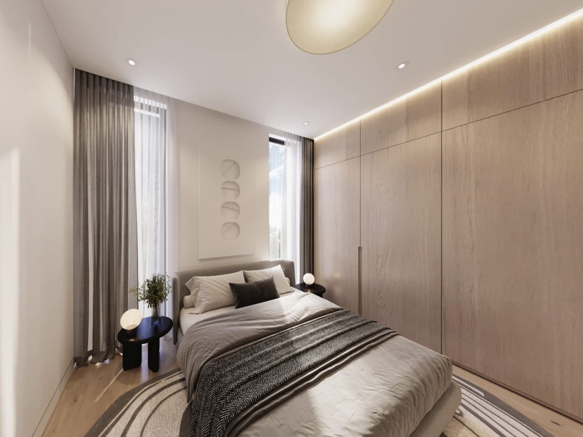 Principal bedroom with a full wall of wardrobes