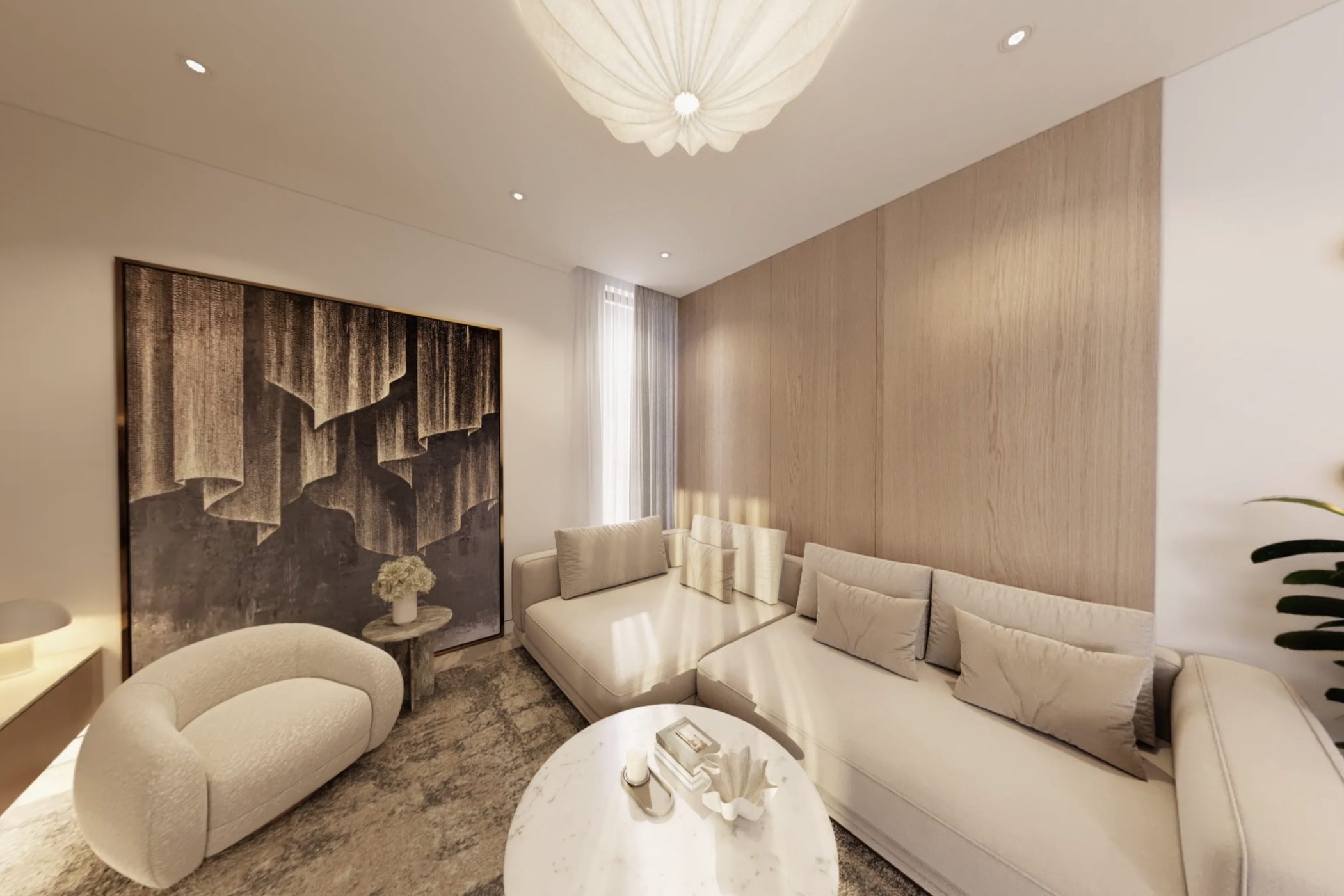 Living room with a corner sofa and an art wall